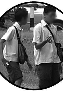 Caning offence: three students in school shorts were seen sharing a cigarette from a pack they had just bought