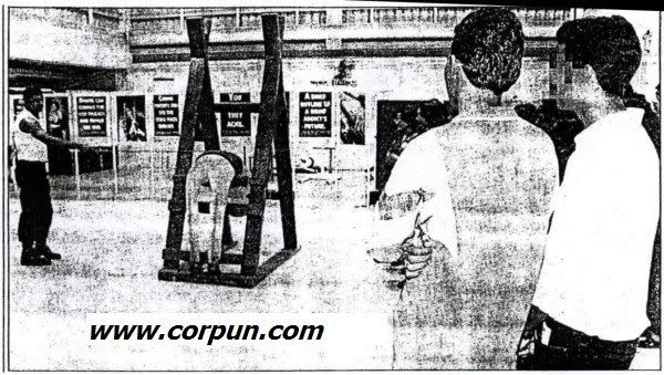 Teens watch caning of dummy