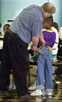 A paddling under way in the school canteen