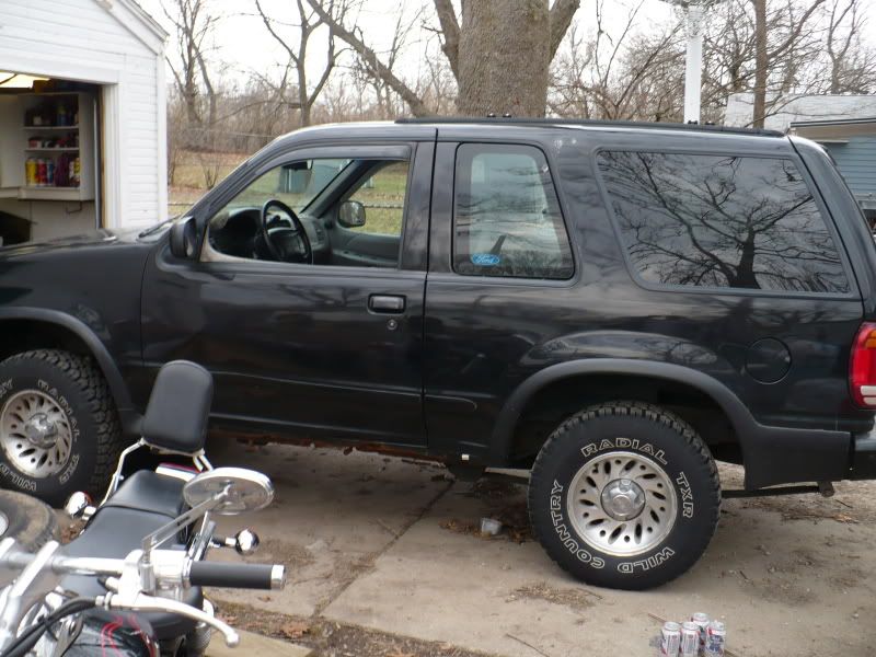 1999 Ford Explorer Lifted. working on the lift. the