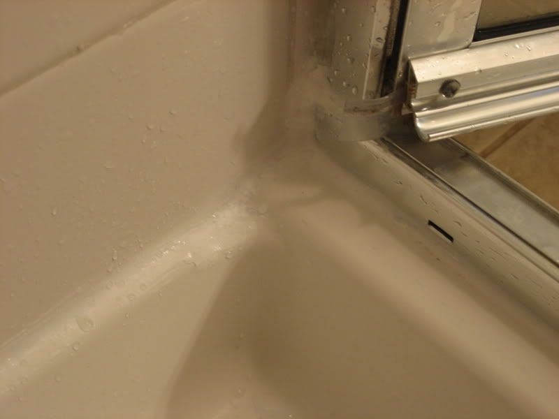 Help find source of Shower Door leak with photos!!!