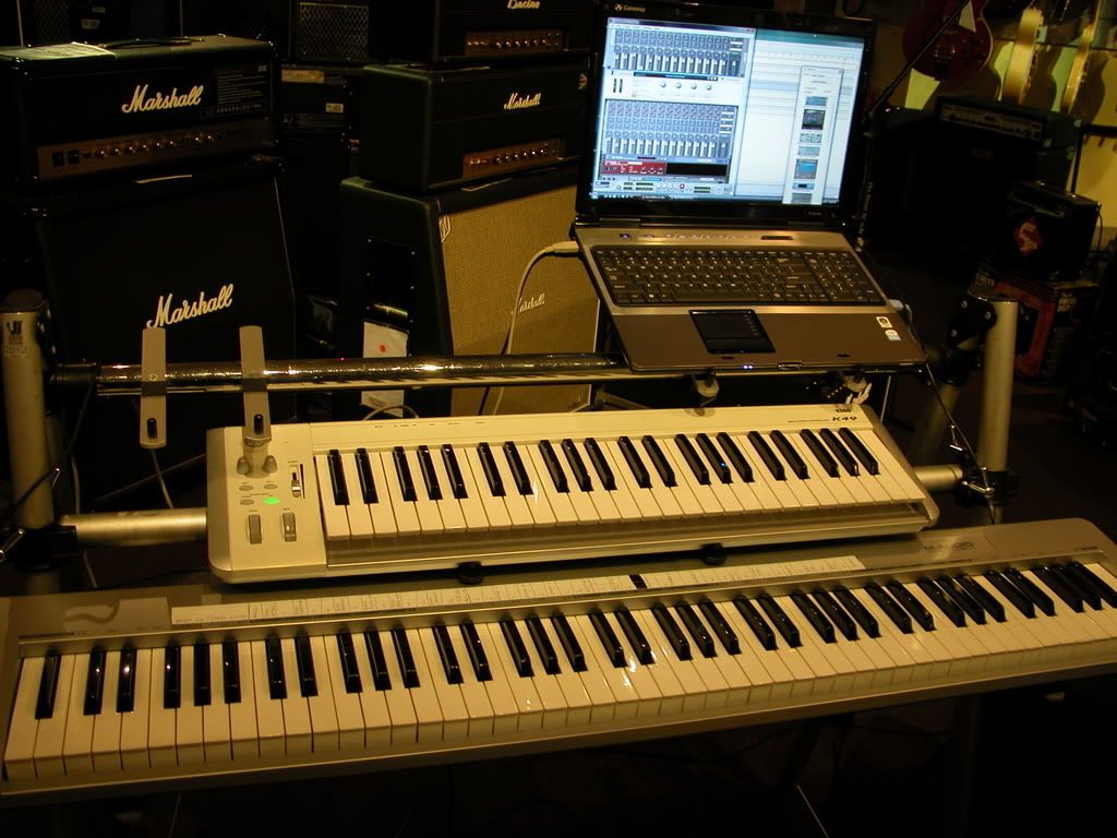 SOFTWARE SIDE: M-Audio Keystation 88es, Korg K49, Gateway P6301 laptop running Reason 4.0