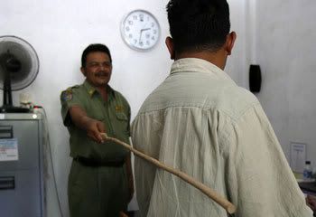 Caning demonstration