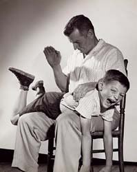 Parental spanking (staged picture)