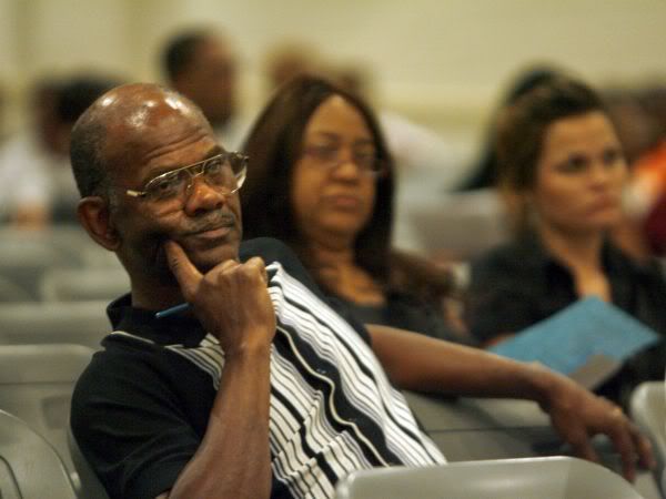 David Gross listens as members of the community are given a chance to talk about  Blue Ribbon during a town hall meeting with the Memphis City School board at Whitehaven High.