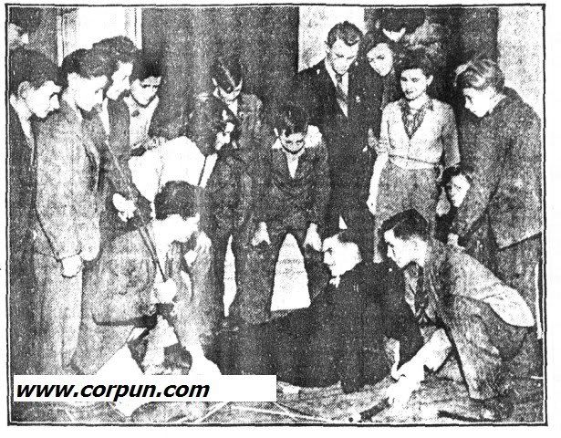 Wildman and students on floor