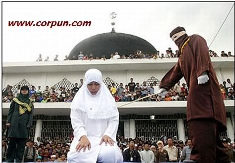 Woman being caned - Click to enlarge