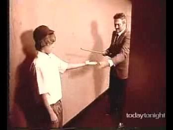 Dramatised reconstruction of caning on hand