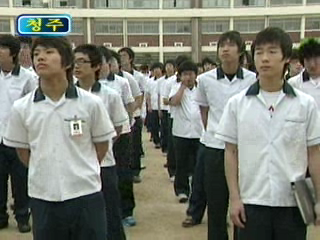 Schoolboys assembled at ceremony