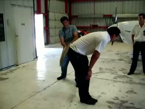 Paddling in aircraft hangar